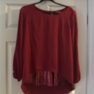 Maroon blouse with sequence.